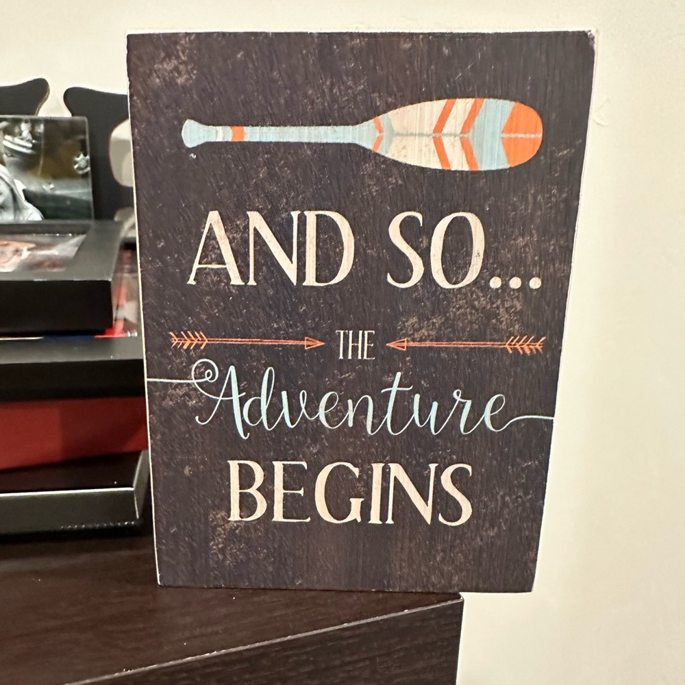 “And so the adventure begins” home decor sign